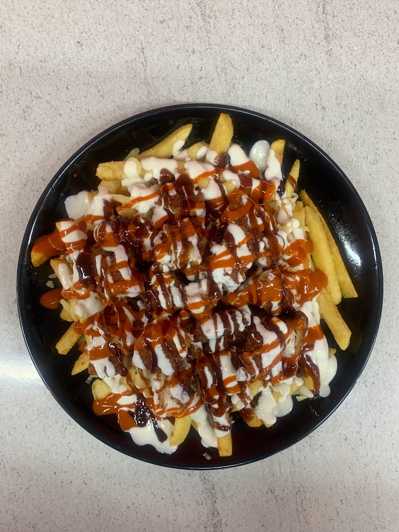 Hoppers Charcoal Chicken photo 4